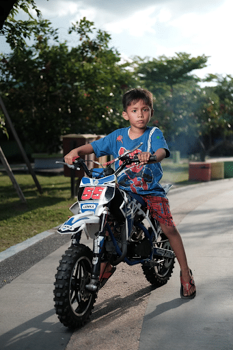 boy playing on bike