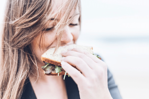 girl eating sandwich