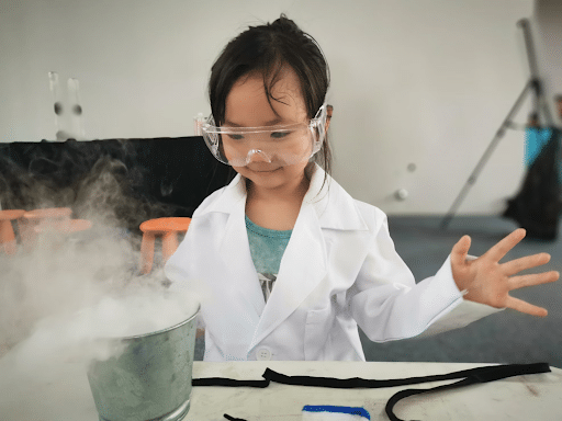 girl playing with chemistry set