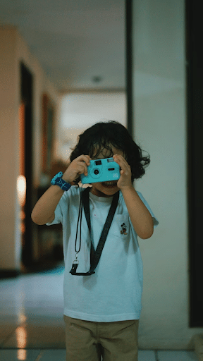 kid looking in camera